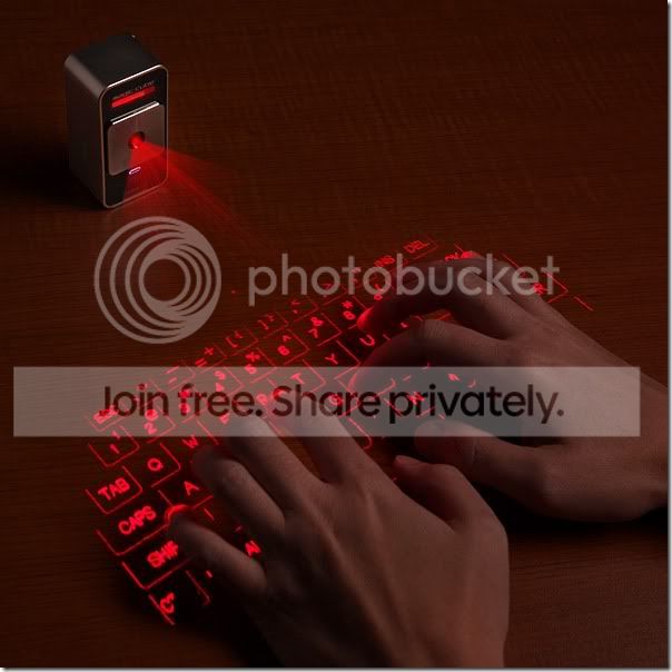 e722_cube_laser_virtual_keyboard_for_iphone_inuse_thumb.jpg